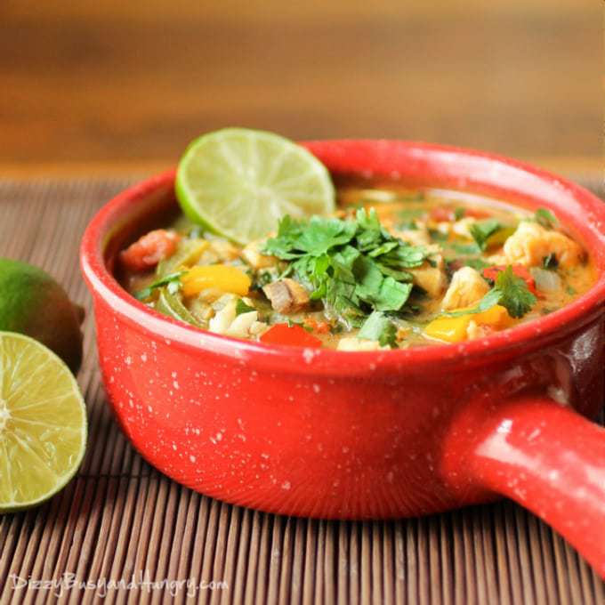 Brazilian Fish Stew in a red campfire style soup mug