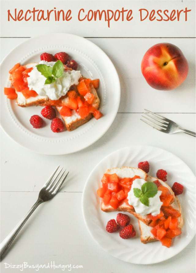 Overhead shot of two white plates with nectarine compote dessert with a nectarine and forks on the side. 