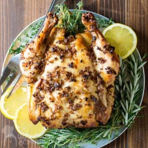 overhead view of slow cooker whole chicken with golden brown, crispy skin