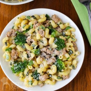 Overhead view of ground turkey pasta broccoli dinner on a white dish
