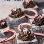 Front view of no-bake peppermint mocha cookies with candy canes on the side placed on an upside down muffin tray