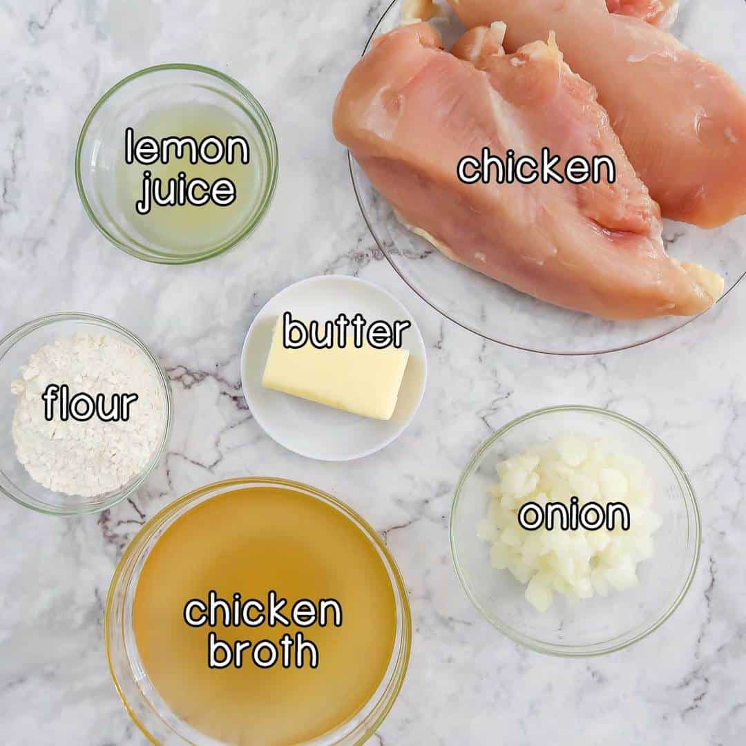 Overhead shot of ingredients- chicken, lemon juice, butter, flour, onion, and chicken broth.