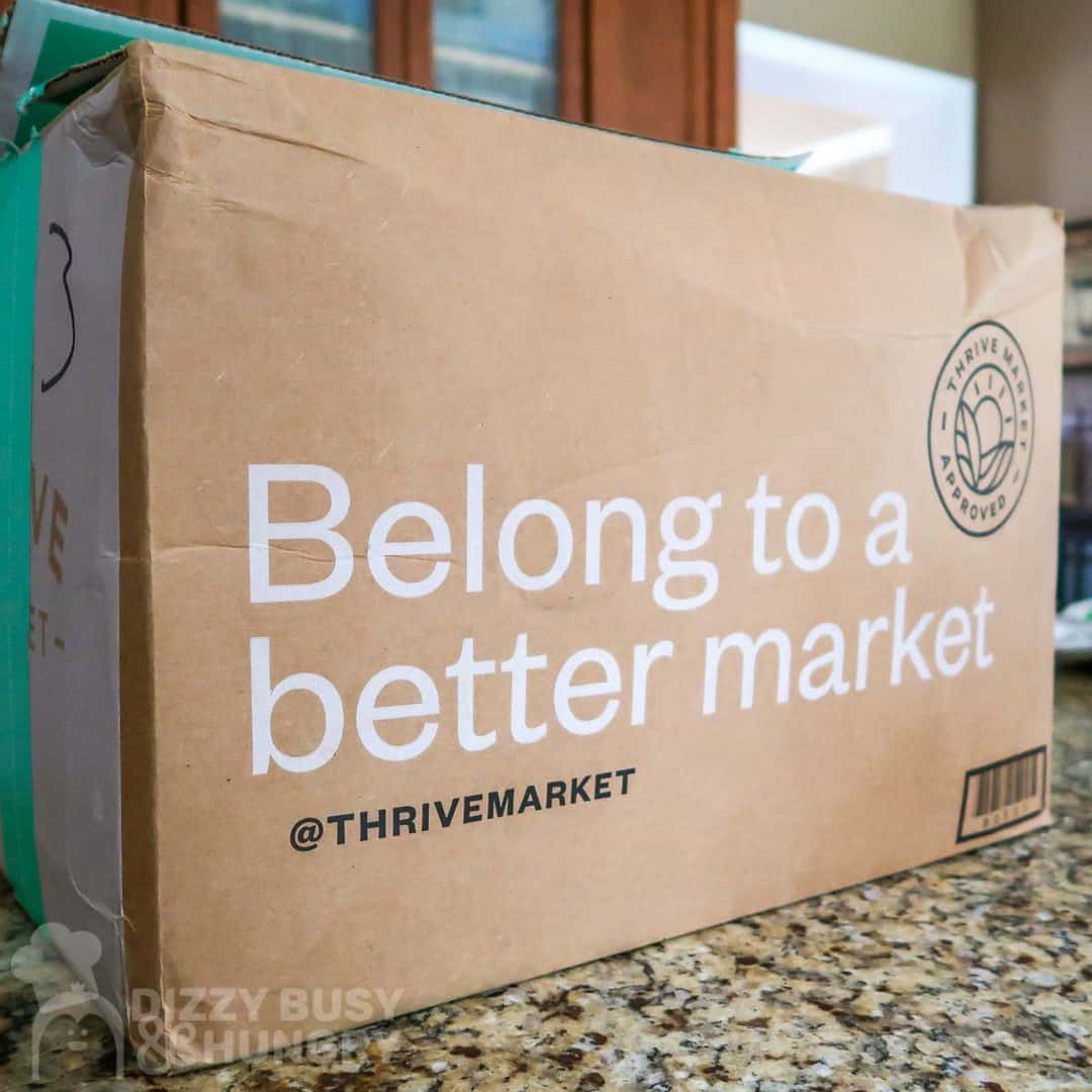 Photo of Thrive Market shipping box on a kitchen counter.