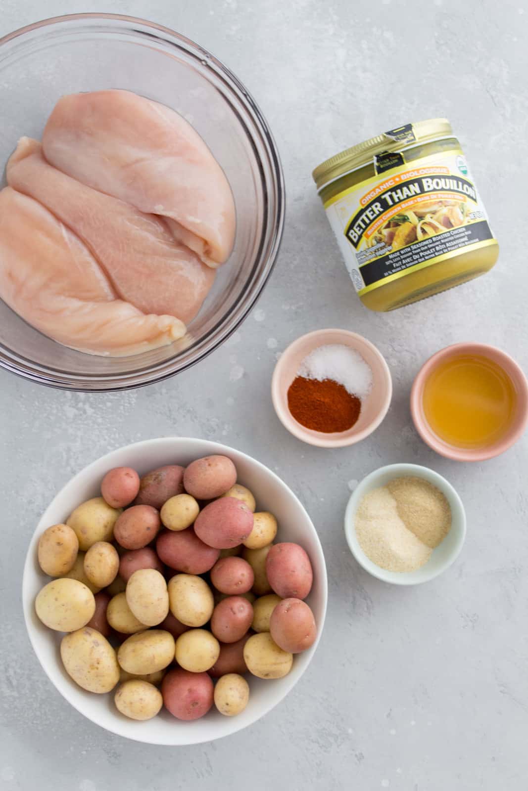ingredient flat lay of what is needed to make instant pot chicken and potatoes.