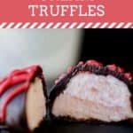 Close up side view of a strawberry cream truffle cut in half.