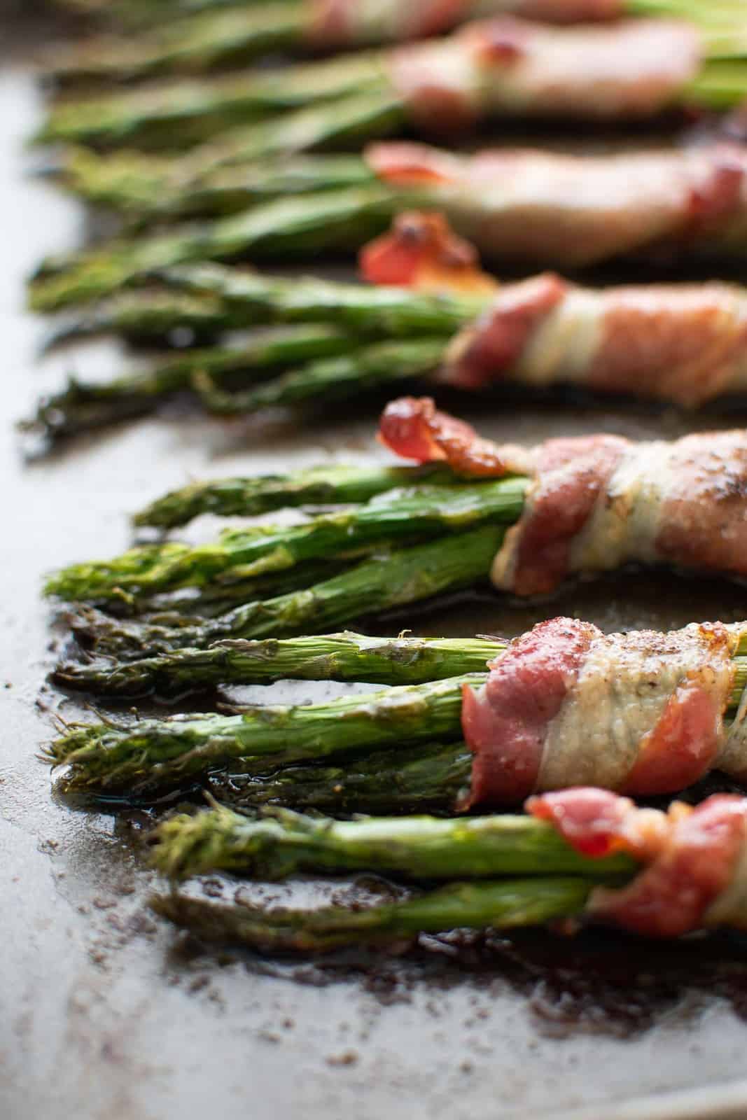 Roasted asparagus wrapped in bacon.