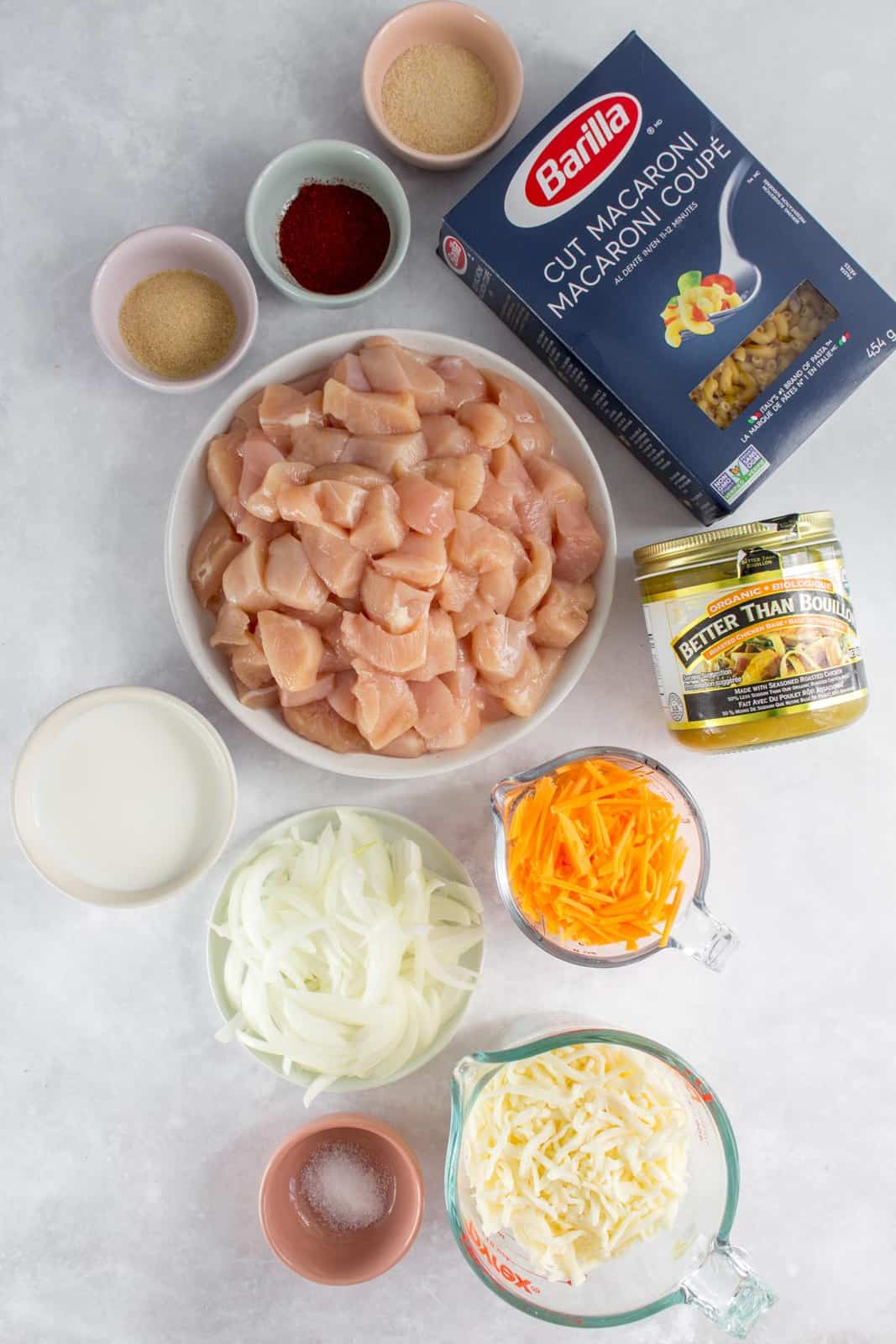 Overhead image of ingredients needed for chicken mac and cheese.