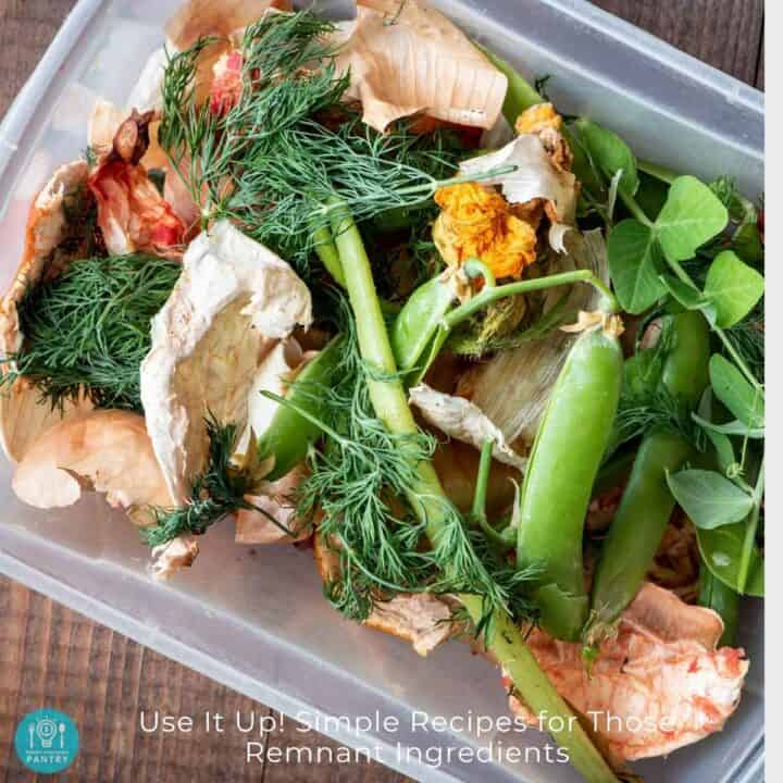 Overhead view of remnant herbs and other ingredients in a plastic bin.