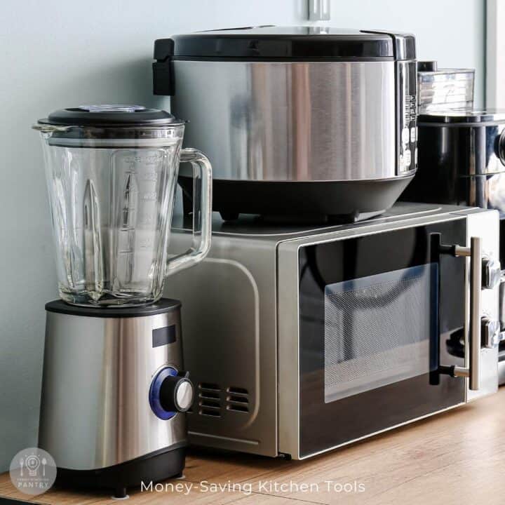 Photo of a blender, microwave, instant pot, and other small kitchen appliances.