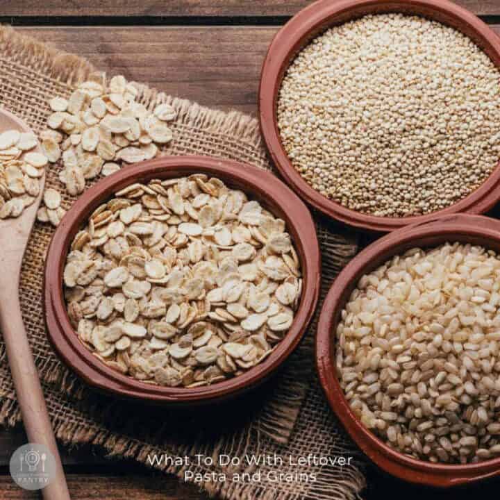 Cracked oats and grains in rustic bowls on wooden surface with a burlap placemat for healthy leftovers recipes.