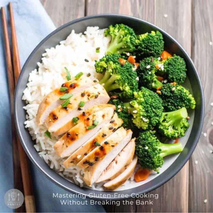 Photo from above of a gray ceramic bowl containing rice, sliced cooked chicken breast, and broccoli florets as an example of gluten-free cooking.