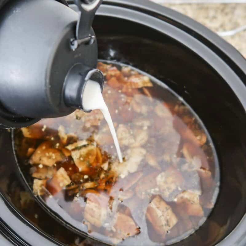 Overhead view of process shot 4 - about 45 minutes before you are ready to serve, combine the flour with the water, then slowly add the mixture to the crock pot while stirring.
