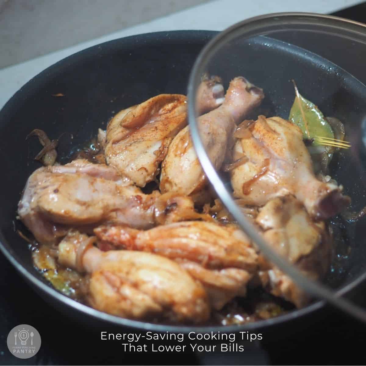 Photo of chicken cooking in a skillet on the stovetop to illustrate energy-saving cooking tips.