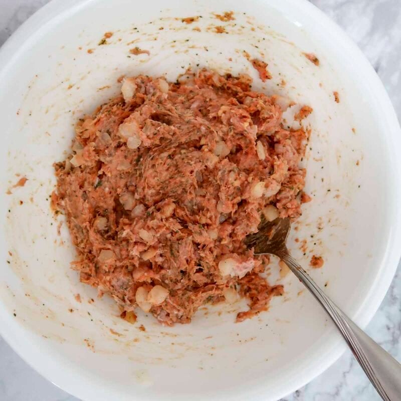 Overhead view of burger process shot 2 - mix the ingredients well.