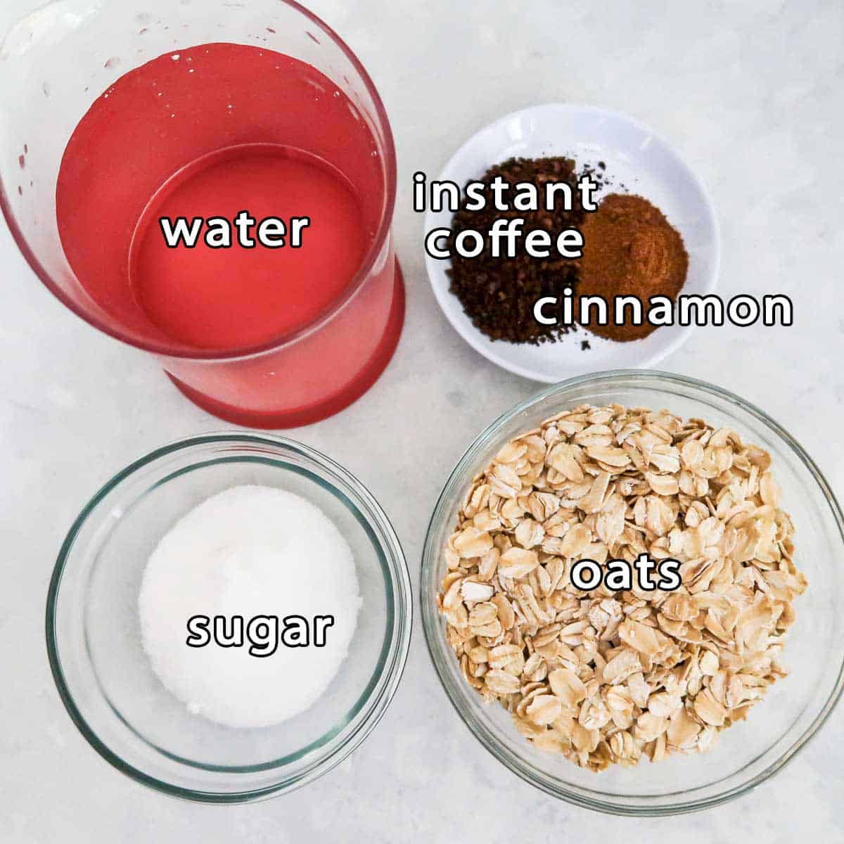 Overhead shot of ingredients - water, sugar, oats, instant coffee, and cinnamon.