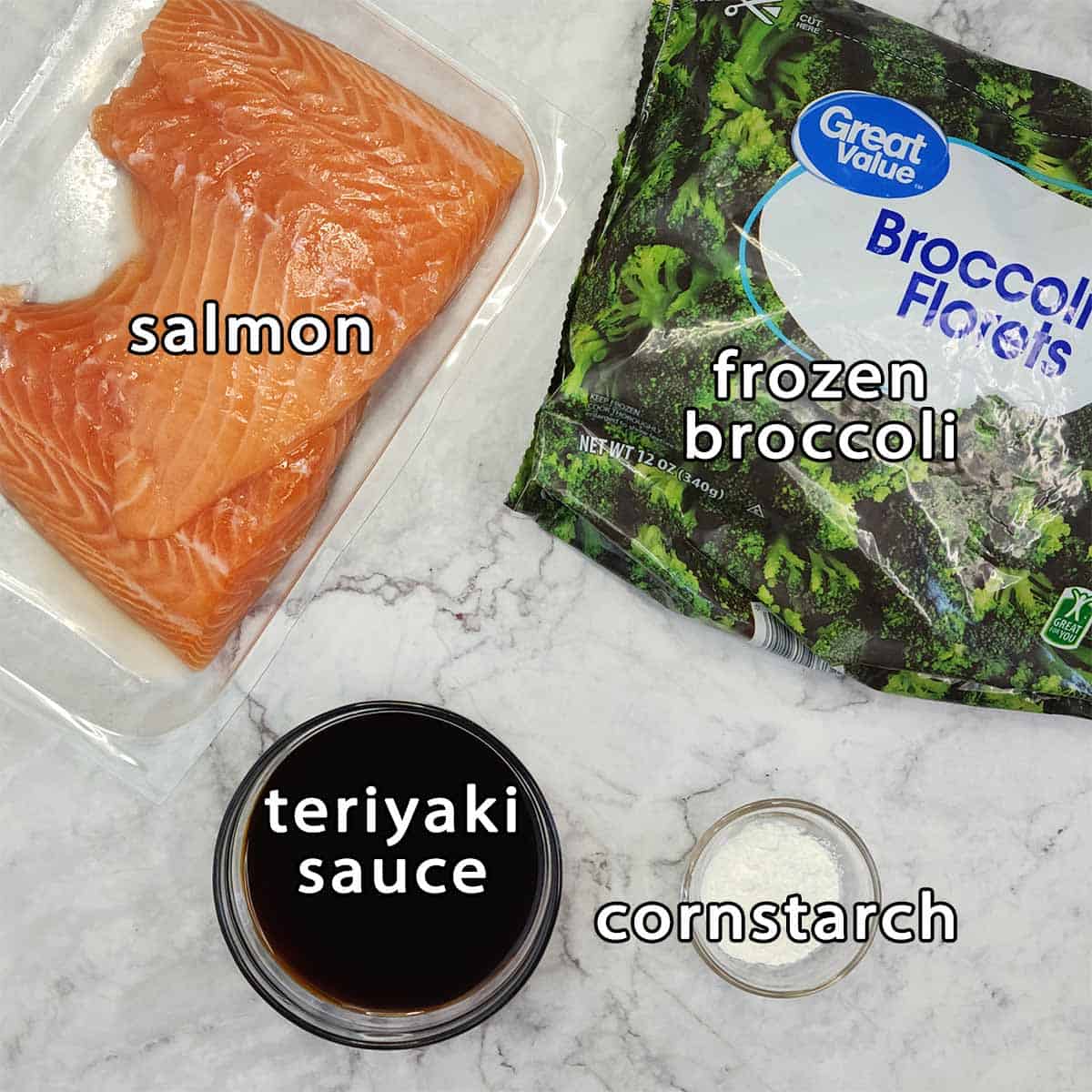 Overhead shot of ingredients - salmon, broccoli florets, teriyaki sauce, and cornstarch.