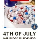 Side shot of patriotic muddy buddies in a white bowl on a white surface with blue and white bowls in the background.