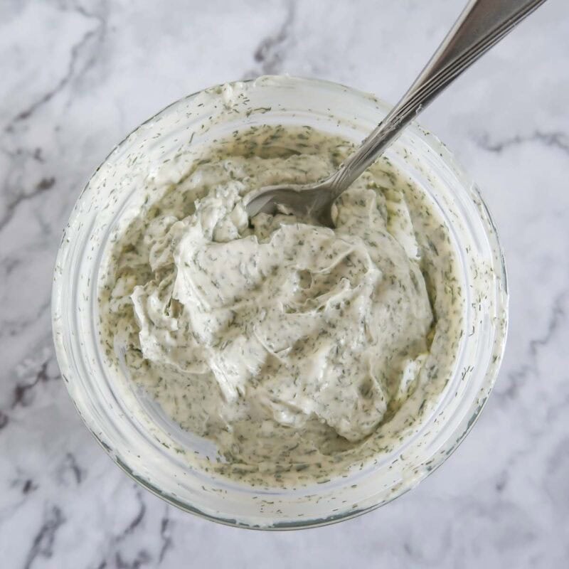 Overhead view of process shot 2 - combine the butter and dill weed.