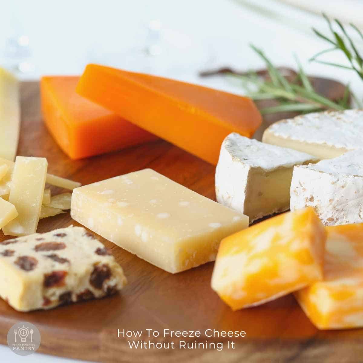Side view of cheese blocks on a cutting board to introduce the article on how to freeze cheese the correct way.