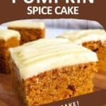 Side shot of multiple square pieces of pumpkin spice cake with cream cheese frosting on a wooden surface.