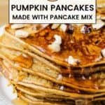 Side close up shot of pumpkin pancakes stacked on a white plate drizzled with maple syrup and sprinkled with chopped walnuts.